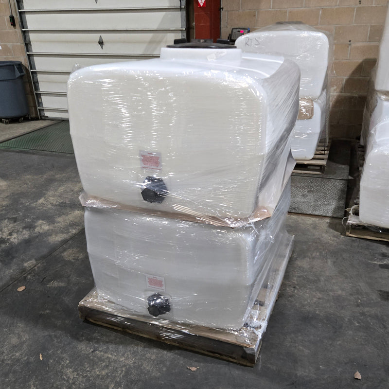 Four 150 Gallon Water tanks ready for shipment
